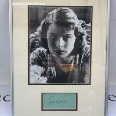 A framed and glazed photo display of Ingrid Bergman, approx 32cm x 42cm. No COA. Please note that we are not experts in this field and can offer no guarantees that these signatures are genuine and will not be held responsible should they prove otherwise.