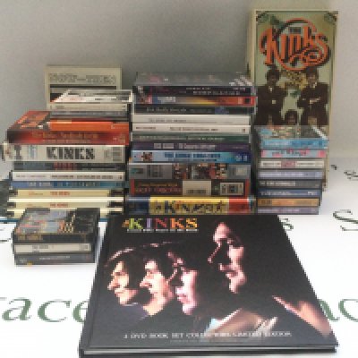 A collection of Kinks CD box sets, DVDs, VHS tapes and audio cassettes.
