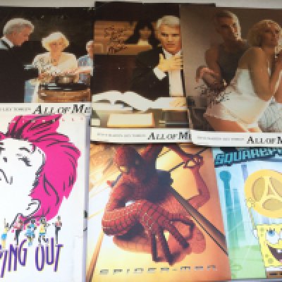 A collection of film related memorabilia comprising some Steve Martin signed lobby cards for 'All Of Me', movie press packs, Star Trek poster etc.