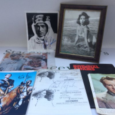 A collection of movie star autographs comprising Sir John Mills, Kirk Douglas, Peter O'Tools, Elizabeth Taylor and others plus an 'Internal Affairs' press pack.