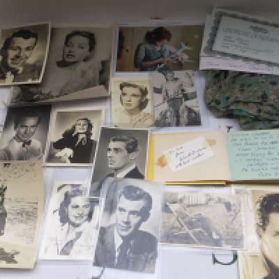 A collection of film and TV memorabilia including publicity cards, some signed and some autopen, a screen used blouse from Eastenders with COA etc.