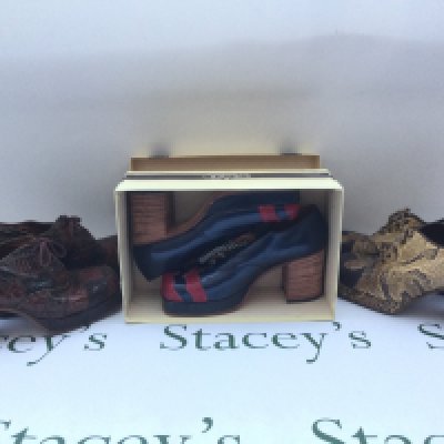 Three pairs of vintage platform shoes.