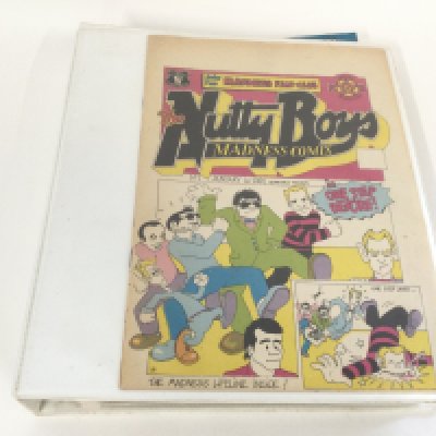 A binder of Madness comics containing 17 Nutty Boys and MIS (Madness Information Service) comics.