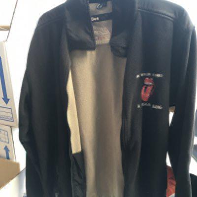 A Rolling Stones crew only tour jacket and 'A Bigger Bang' tour laminate plus a pair of stage used drumsticks as used by Queen's Roger Taylor and given to the vendor by Rufus Taylor, Roger's son. Further provenance available upon request.