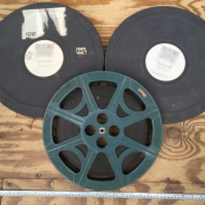 Two cans of film reels for the 1991 movie 'The Pope Must Die' plus an extra unidentified reel. Untested.