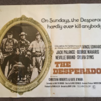 Four film posters of Westerns comprising a UK quad of 'Desperados', a French one sheet of 'Arizona Raiders' and two others., all folded with small tears.