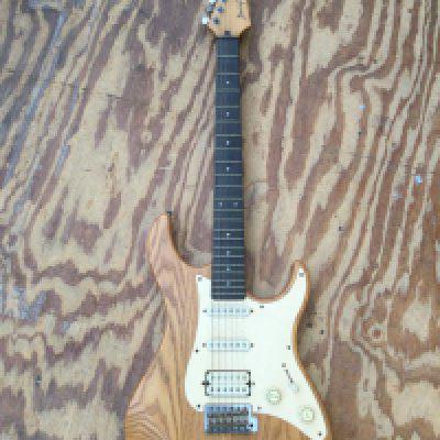 A Yamaha Pacifica electric guitar. No case.