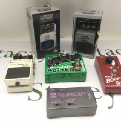 Five effects pedals comprising a Seymour Duncan Pickup Booster, Boss LS-2 and others.