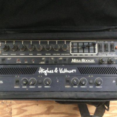 A Hughes & Kettner VS250 power amp, a Mesa Boogie studio preamp, a Yamaha FX770 effects processor and a Crate CA-1P acoustic guitar preamp.