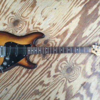 A scratch built Partscaster Strat style electric guitar comprising a swamp ash body fitted with EMG active pickups, Kahler locking tremelo and a Wilkinson roller nut. The neck is from a Japanese squier with drop D tuner. No case.