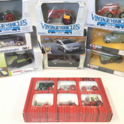 A Collection of Boxed Diecast Including Ertl.Mini Champs. Corgi. Etc.