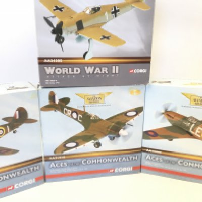 4 X Boxed Corgi Aviation Archive Aircraft including A Spitfire. A P-40E Kittyhawk. A Hawker Hurricane and a FW-190A-4.