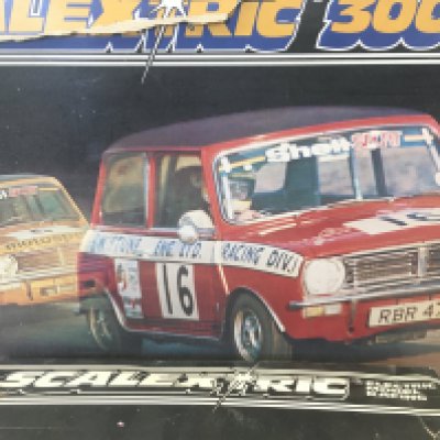 A Boxed Scalextric Mini Racing Set. With Extra Cars. (2). No Reserve.
