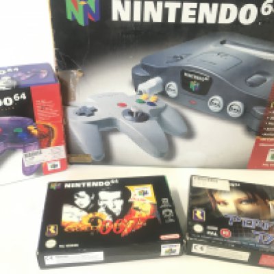 A Boxed Nintendo 64 with Spare Controller and 2 Games including Golden Eye.