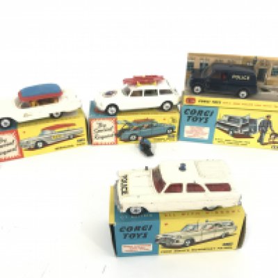 4 Boxed Corgi Vehicles. A Bermuda Taxi #430. A Citroen Safari #475 a Police Van (no Dog of police man.)#448 and a Ford Zephyr Motorway Patrol A/f #419.