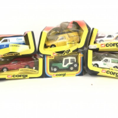 A Collection of Boxed Corgi Vehicles. Including a CJ-5 Jeep #419. And Ford Escort Vans. Boxes Are Worn.