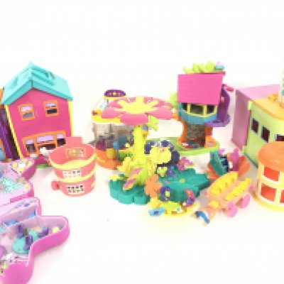 A Box Containing a Large Collection of Polly Pocket buildings And Accessories and others.