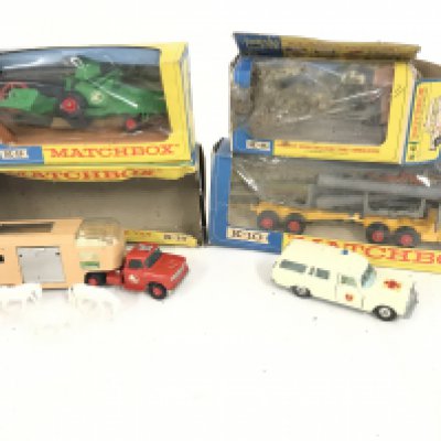 4 Boxed Matchbox Vehicles. A Articulated Horse Van #K-19. A Mercedes Benz Ambulance #k-6. A Combine Harvester #k-9 and a Pipe Truck #K-10. Boxes a Very worn.