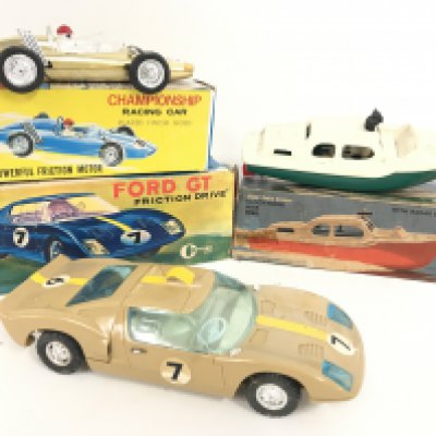 3 Boxed Plastic Vintage Toys. A Clifford Series Friction Drive Ford GT. A Championship Racing Car. And a Clockwork Clyde Cabin Cruiser