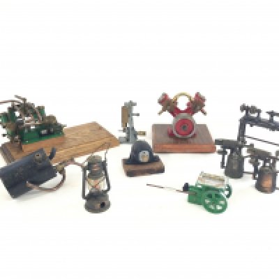 A box containing various live steam engine tools and accessories.