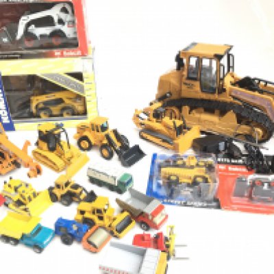 A Collection of Boxed And Loose Construction Vehicles Including a R/C Digger. Matchbox Etc. NO RESERVE