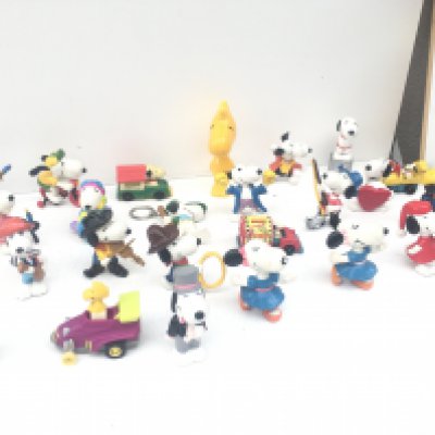 A collection of Collectable Snoopy figures of varying ages. NO RESERVE