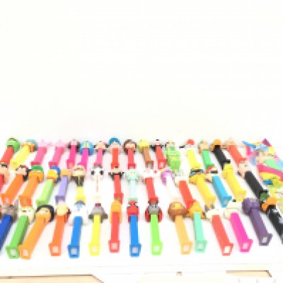 A collection in excess of 50 PEZ DISPENSERS WITH MANY DIFFERENT CHARACTERS AND OF VARYING AGES. NO RESERVE