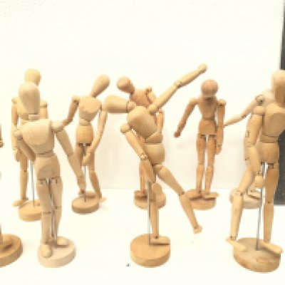 A collection of of 9 articulated human wooden mannequins approximately 12 inches. All have good movement to joints enabling any poses to remain. NO RESERVE