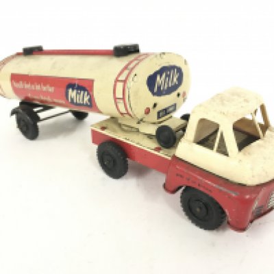 A Tinplate Wells Brimtoy Milk Tanker. friction Powered.