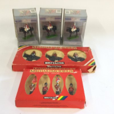 3 Britains lifeguards in Perspex cases. Set 7233 Queen and hinchfield Calvary . Set 7249 queens colour party scouts guards.