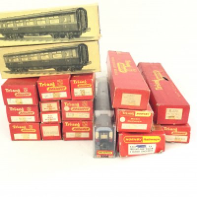 A box containing over 40 boxed Triang Hornby carriages and coaches.