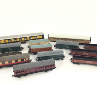 A box containing a quantity of rolling stock Hornby Trix Duplo etc.