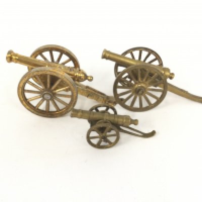 3 early solid brass model cannons.