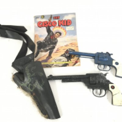 2 X z vintage Cap Guns by Lone Star and Cresent Toys. Including a Cisco Kid Holster and Comic.