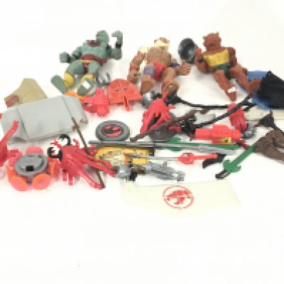 A collection of of Thundercats action figures , spare parts and accessories.