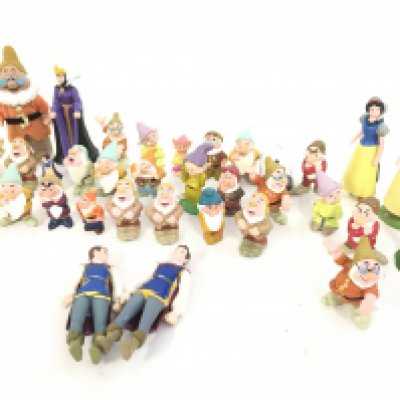 A Collection of Various loose Disney Snow White Figures.