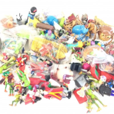A box containing a large quantity of plastic figures. Mostly Disney to include Peter Pan. Bugs Life and Snow White.