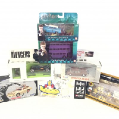 7 Boxed Corgi model vehicles to include James Bond Harty Potter The avengers Inspector morse and The Beatles.
