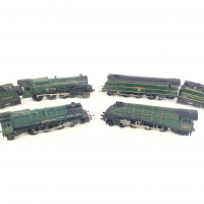 A box containing 4 Hornby 00 Gauge locomotives. To include Mallard 60022. Princess Victoria 46205. King Henry V. Plymouth 21C103.