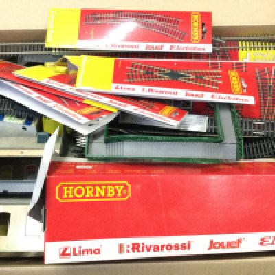 A Box Containing 00 Gauge Buildings and Track. No Reserve.