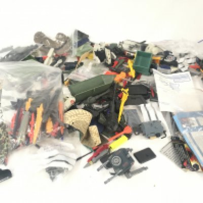 A collection in excess of 150 pieces of of GI Joe parts and accessories