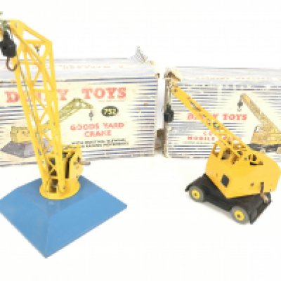 A Boxed Dinky Toys Goods Yard Crane #753 and a Cole̢&#2013266057&#2013265922&#2013266146s Mobile Crane #971. Boxes are very worn.