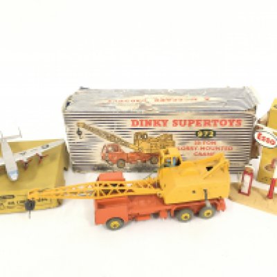 A Boxed Dinky Avro York Air Liner #704. A 20-Ton Mounted Crane (Worn Box) #972 and a Esso Petrol Pump #781.