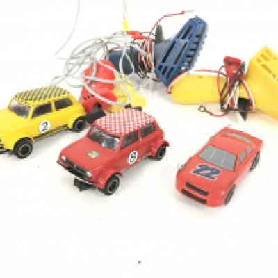 A Small Collection of Scalextric Cars. And Controllers.