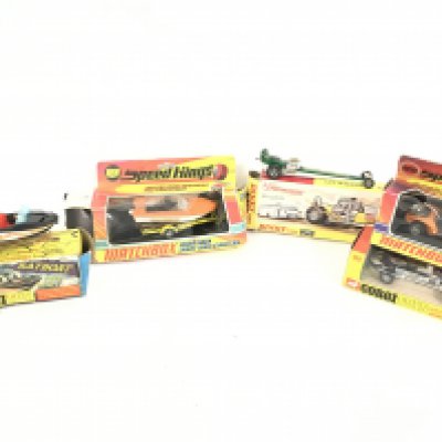 A Box Containing Playworn and Boxed Toys including a Boxed Corgi Batboat.