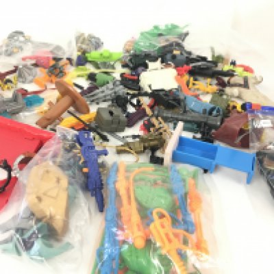 A collection of 1980s and 1990s assorted accessories from numerous toy lines