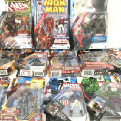 A Collection of Carded Marvel Figures. And a small Collection of Stargate Construction Toys. No Reserve.