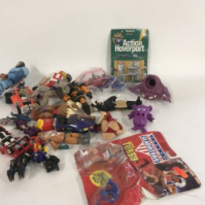 A mixed collection of 80s figures..toys and accessories including Mash..Ghostbusters..etc