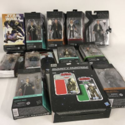 A collection of Star Wars Black series figures all in original packaging