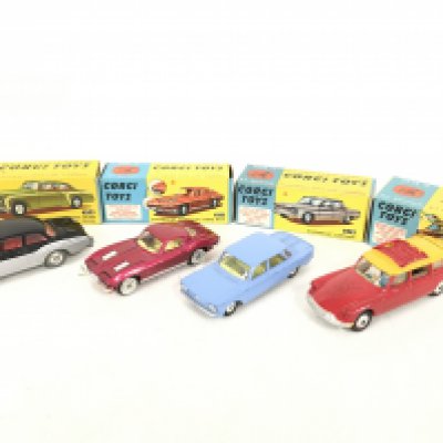 4 Boxed Corgi Vehicles. A Bentley Continental Sports Saloon #224. A Chevrolet Corvette Sting Ray #310. A Chevrolet Corvair #229 A/F and a Citroen Safari #436 (Re-Painted).